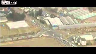 Aerial view of tsunami striking Sendai Japan [upl. by Frendel]