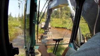 Excavator Busting Beaver Dams [upl. by Okemak]